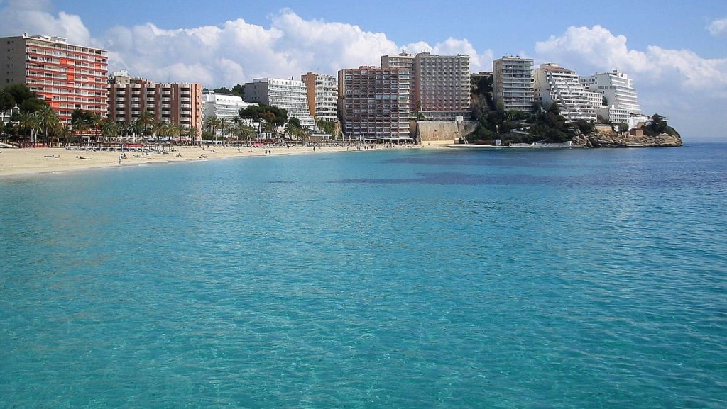 Overtourism no more? The beach at Magalluf, a major holiday resort in the municipality of Calviá Wikimedia. By Rafael Ortega Díaz (CC BY-SA 3.0) via Wikimedia. Cropped and enhanced by "GT". https://commons.wikimedia.org/w/index.php?curid=1899528