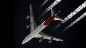 Tourism accounts for approximately 8% of emissions, much of it from planes ... A Qantas Boeing 747-400 flying at approximately 11,000 metres over Starbeyevo in Moscow, May 2010. By Sergey Kustov http://www.airliners.net/photo/Qantas/Boeing-747-438/1729381/L/ (CC BY-SA 3.0) via Wikimedia. https://commons.wikimedia.org/w/index.php?curid=16496086