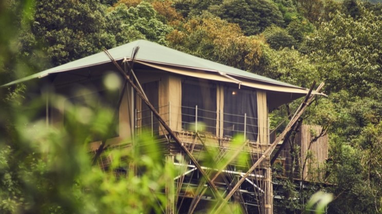 Sustainable accommodation can take the form of luxury in canvas, sticks, and mud. This pic from Vinetree China.