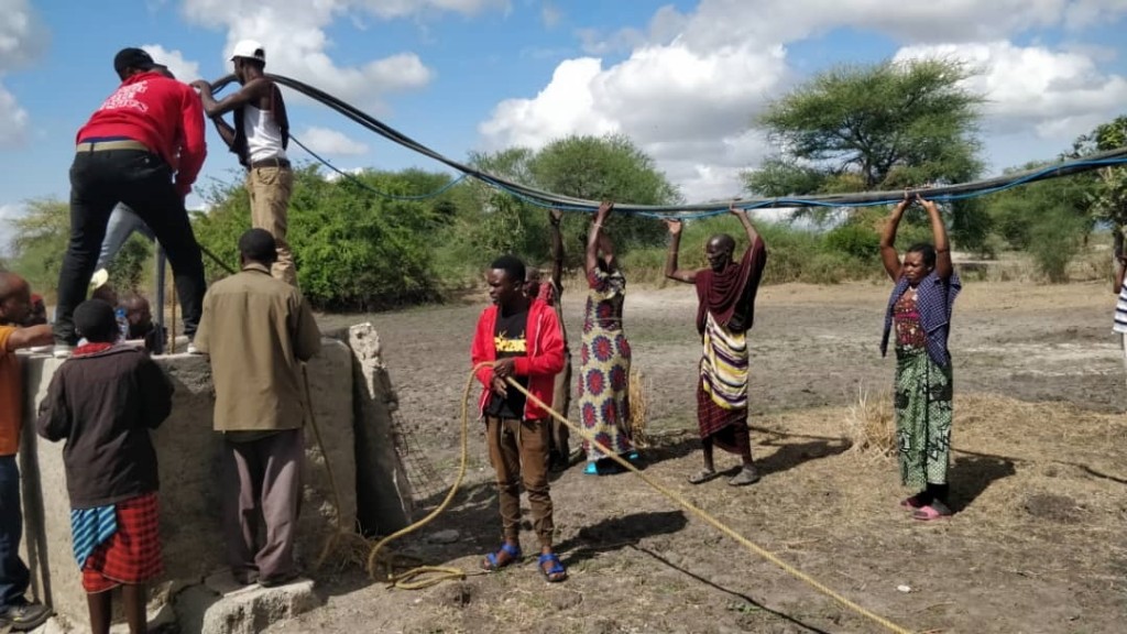 Testing the new water pump at Kakoi village