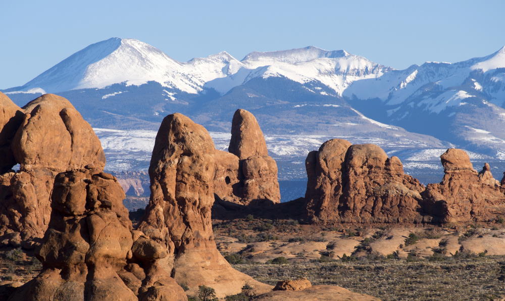 Arches National Park, north of Moab, Utah, USA. Photo by Robb Hannawacker (CC0) via GFP. https://www.goodfreephotos.com/public-domain-images/rock-and-mountains-in-the-landscape-in-arches-national-park.jpg.php