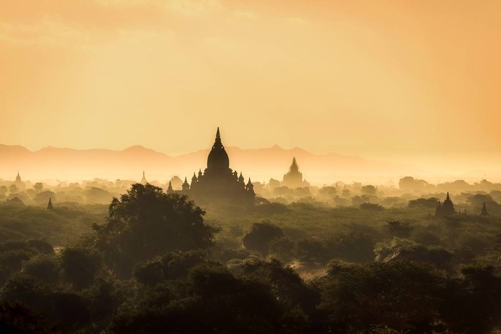 Temples and the golden sun. Myanmar. By 12019 via Pixabay. https://pixabay.com/photos/myanmar-burma-landscape-sunrise-2494826/