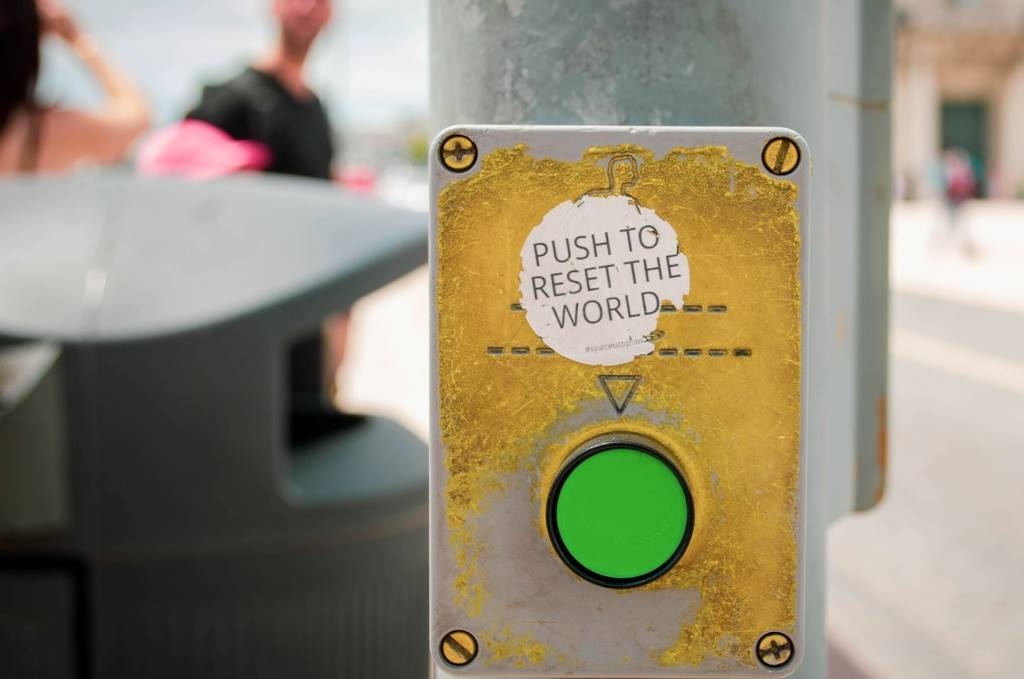 Push to reset the world. By Jose Antonio Gallego Vázquez (CC0) via unsplash.