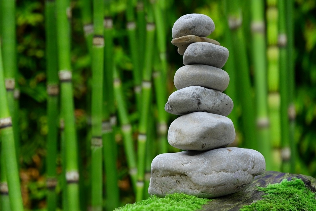 A construction. By EliasSch (CC0) via Pixabay. https://pixabay.com/photos/zen-garden-meditation-monk-stones-2040340/