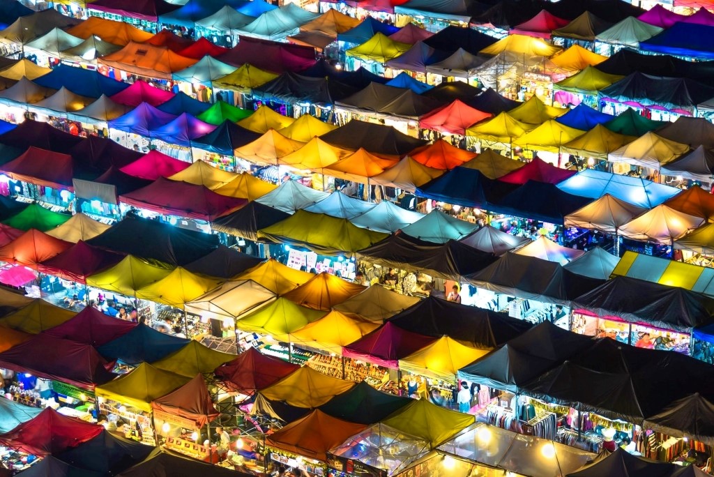 Have freedom, will trade. A Bangkok night market from above, January 2018. By Sam Beasley (CC0) via Unsplash. https://unsplash.com/photos/cpbWNtkKoiU