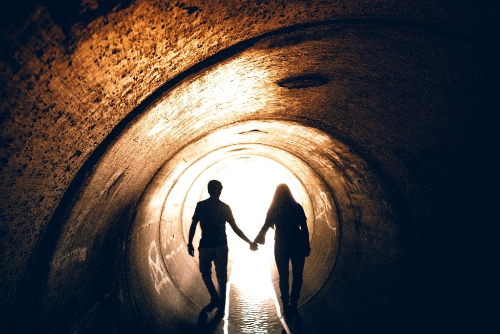 Is there wellness, perhaps even enlightenment, at the end of the COVID-19 tunnel? By Warren Wong via Unsplash. https://unsplash.com/photos/P1fZRtz7-VE