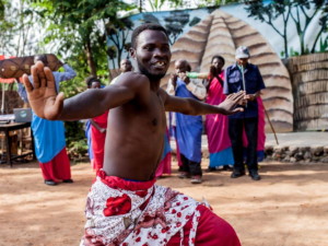 Red Rocks Cultural Festival Rwanda red sarong man dancing