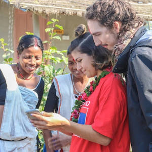 Purposeful travel. Guests interact with the host at Barauli Community Homestay, part of the Community Homestay Network.