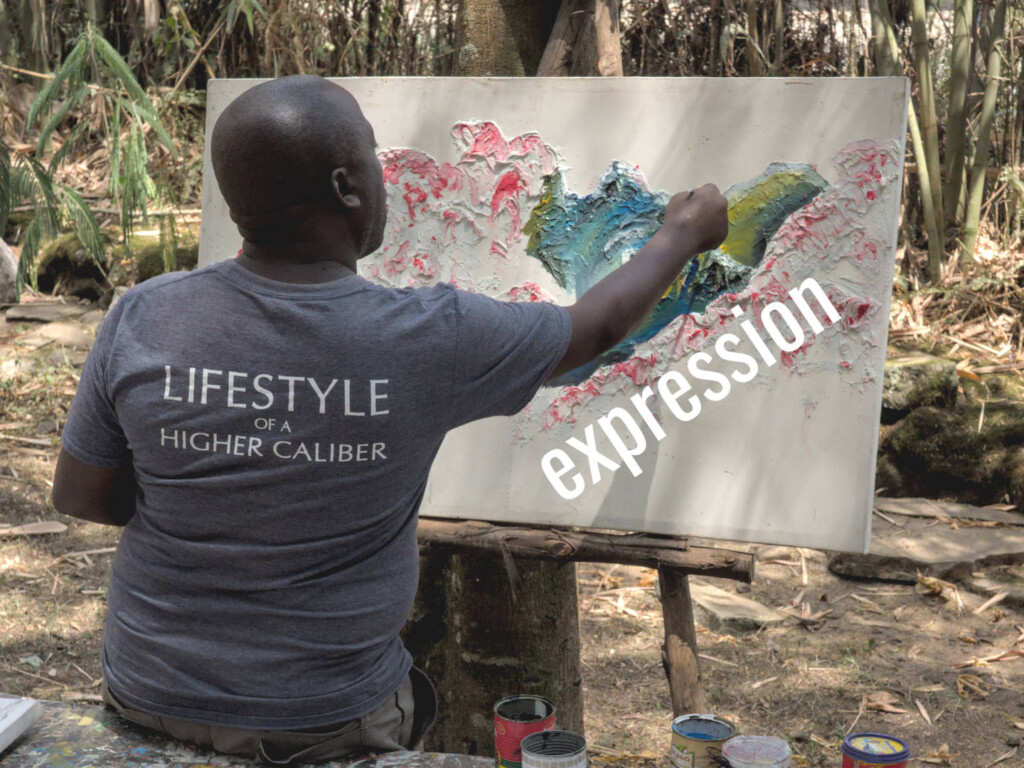 Nyungura ‘Leonard’ Bapfakwita expresses himself in real time at the 2023 Red Rocks Cultural Festival in Rwanda. Picture by David Gillbanks.