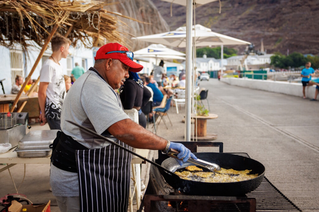 Fresh fish being fried at the seaside Yacht Club. Photo by Mathias Falcone.